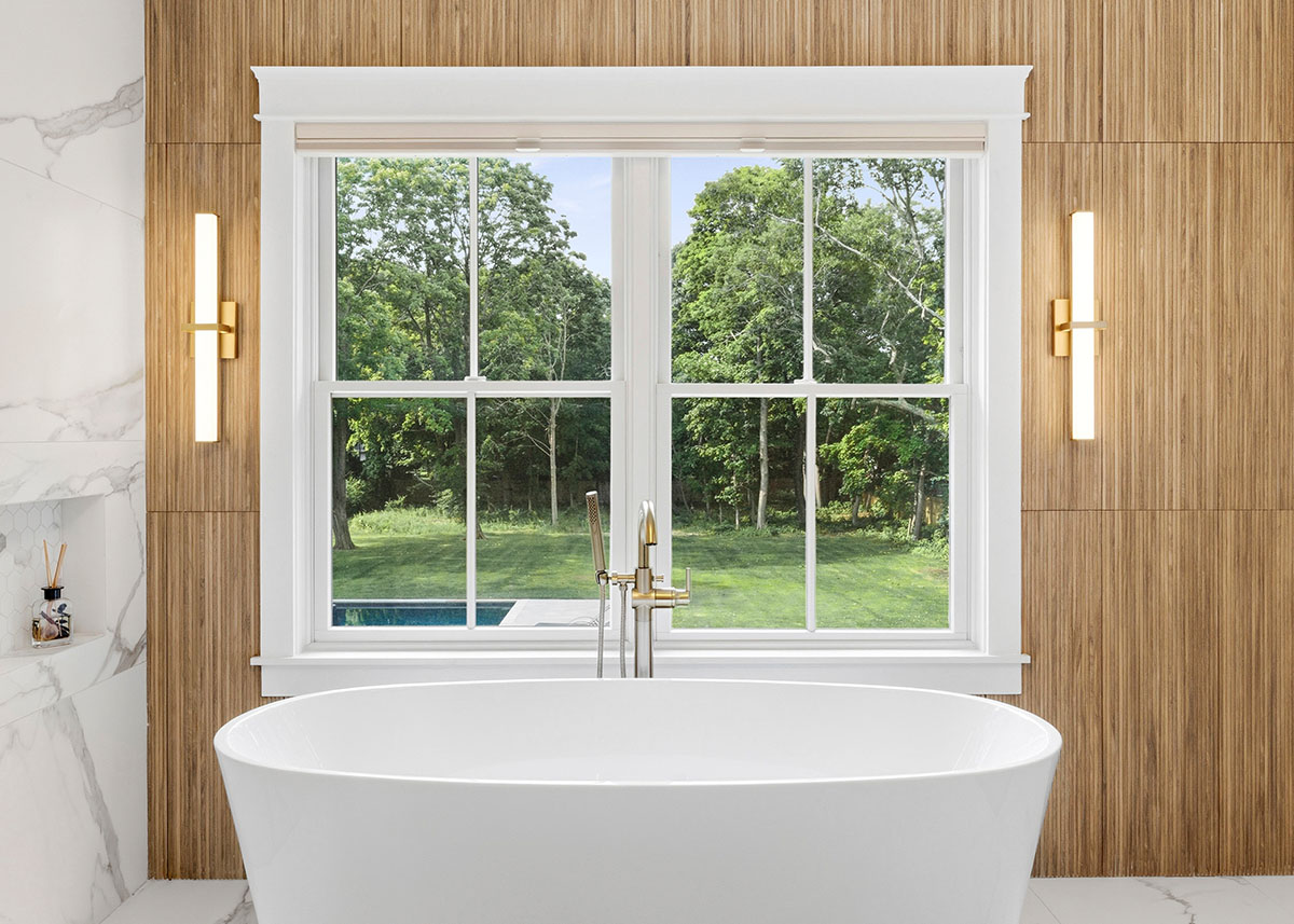 Westhampton09_Second_Shoot_06 Primary bathroom tub-view -- Westhampton Custom Model Home - Modular Luxury